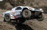 Модель шорт-корс трака Losi TENACITY 4WD Brushless (AVC) (белый/оранжевый)